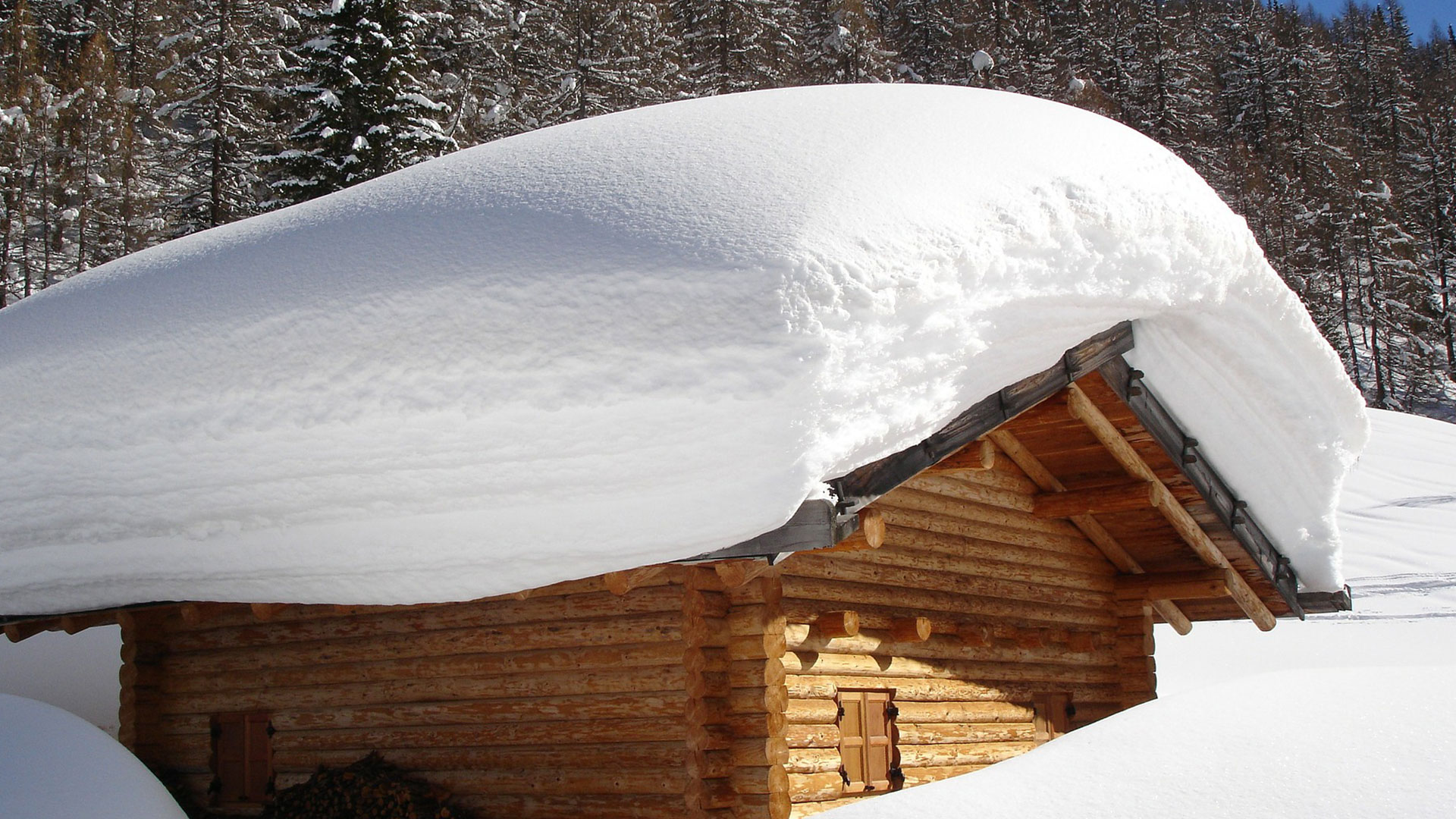 Large Amount of Snow on Cabin Roof